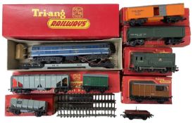 A collection of various Triang 00 gauge rolling stock.