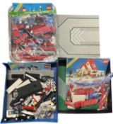 Three Classic Lego Town sets, to include: - 1985 Fire House 6385 - 1986 Police Command Base 6386 -