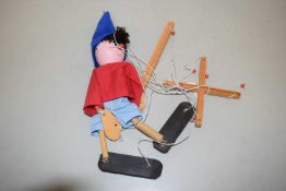 A scratchbuilt hand painted wooden marionette puppet formed as Enid Blyton's Noddy