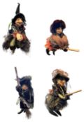 Four hanging Pendle Witches riding broomsticks