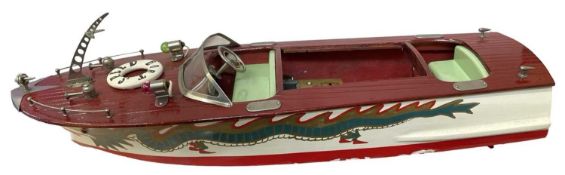 An ITO-style Japanese battery powered speedboat, with Dragon Design, within wooden crate