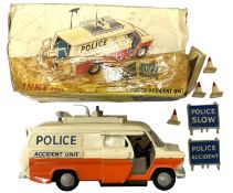 A boxed Dinky Police Accident Unit, with original police signs and traffic cones (box in