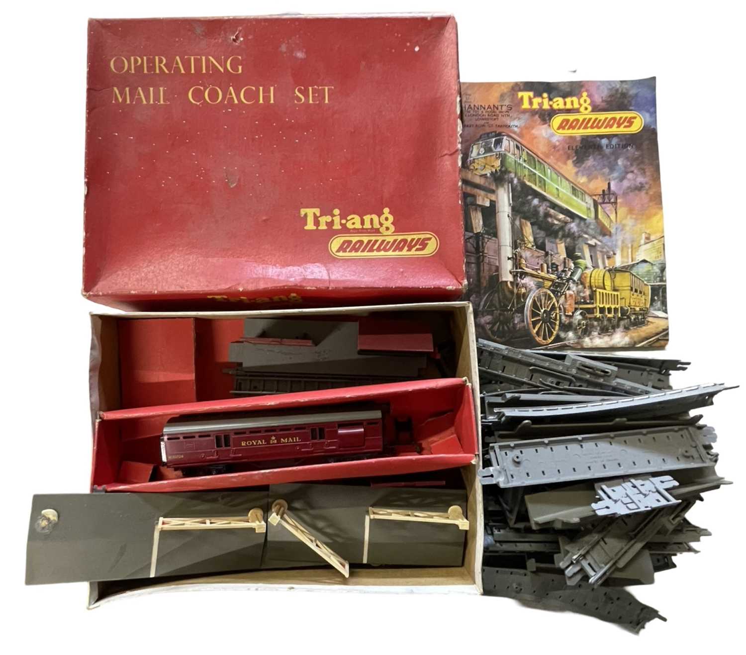 A boxed Triang 00 gauge Operating Mail Coach set, together with a brochure and a quantity of
