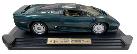 A Maisto 1:12 scale model Jaguar XJ220 (1992) in British Racing Green