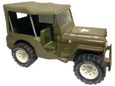 A pressed steel Tonka Jeep