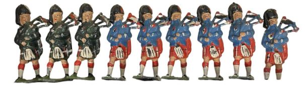 A collection of vintage, unmarked die-cast Highland Soldiers.