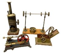 A Bing vertical stationary 'Nora' steam engine, plus flywheel, chained bucket crank, small