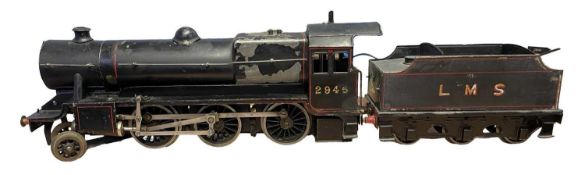 A Bassett-Lowke 2-6-0 locomotive and tender (Mogul) in black LMS livery, number 2945 (a/f) c1940s