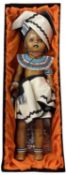 A boxed AboSisi Sisters of Africa doll, 'Xhosa Woman' handmade from newspapers in traditional tribal