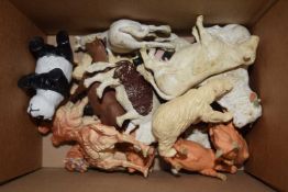 A collection of plastic farm animals, mostly Britains