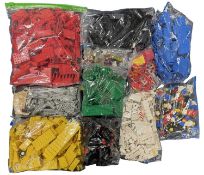 A mixed lot of 1980s loose Lego bricks and minifigures