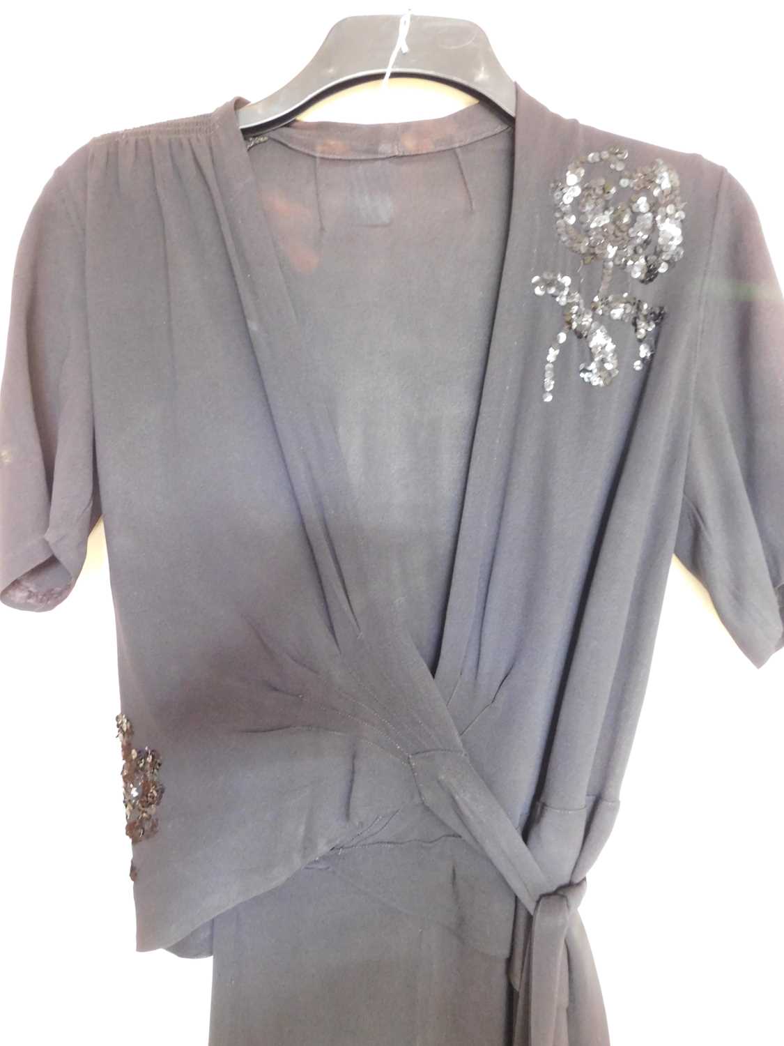 A black velvet evening gown, the sleeveless bias cut V-neck gown with matching shrug and long velvet - Image 9 of 10