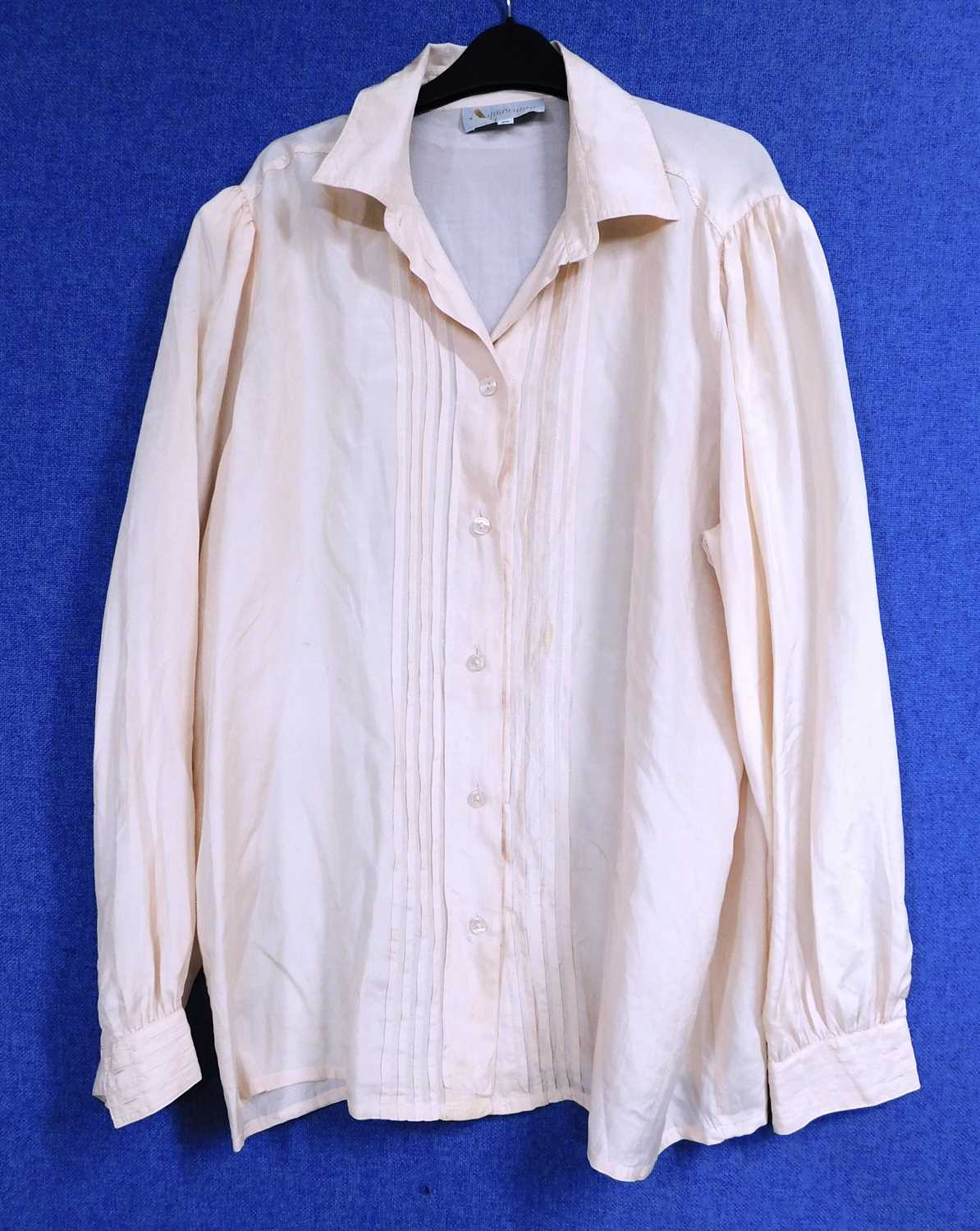 A lady's pale pink silk shirt by Aquascutum, size 40