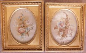 A very near pair of silkwork pictures, both of flowers and foliage on cream silk backgrounds, both
