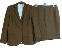 A lady's two piece suit by Paul Costelloe Collection, the black single breasted with patch pockets