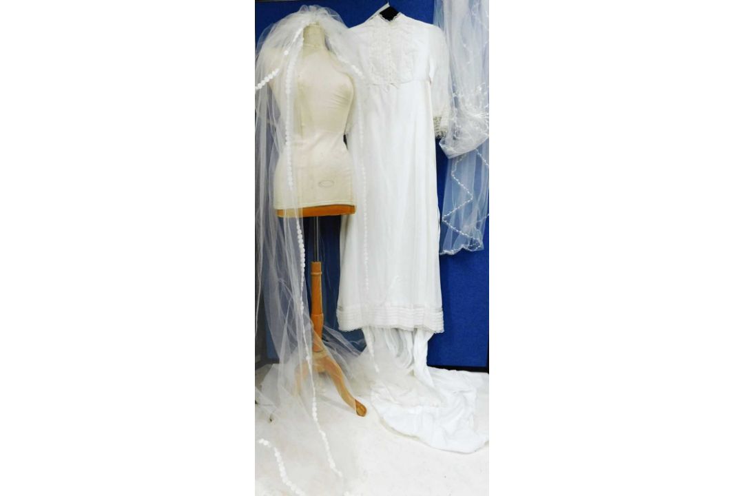 A circa 1960's/70's wedding dress with lace detail to front, frilled cuffs and hem with train - Image 1 of 7