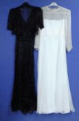 A lady's black net and sequin ribbon V neck dress with matching bolero, together with a cream