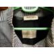 Four items of mid to late 20th Century lady's wear: to include a black and white two piece suit by - Image 7 of 7