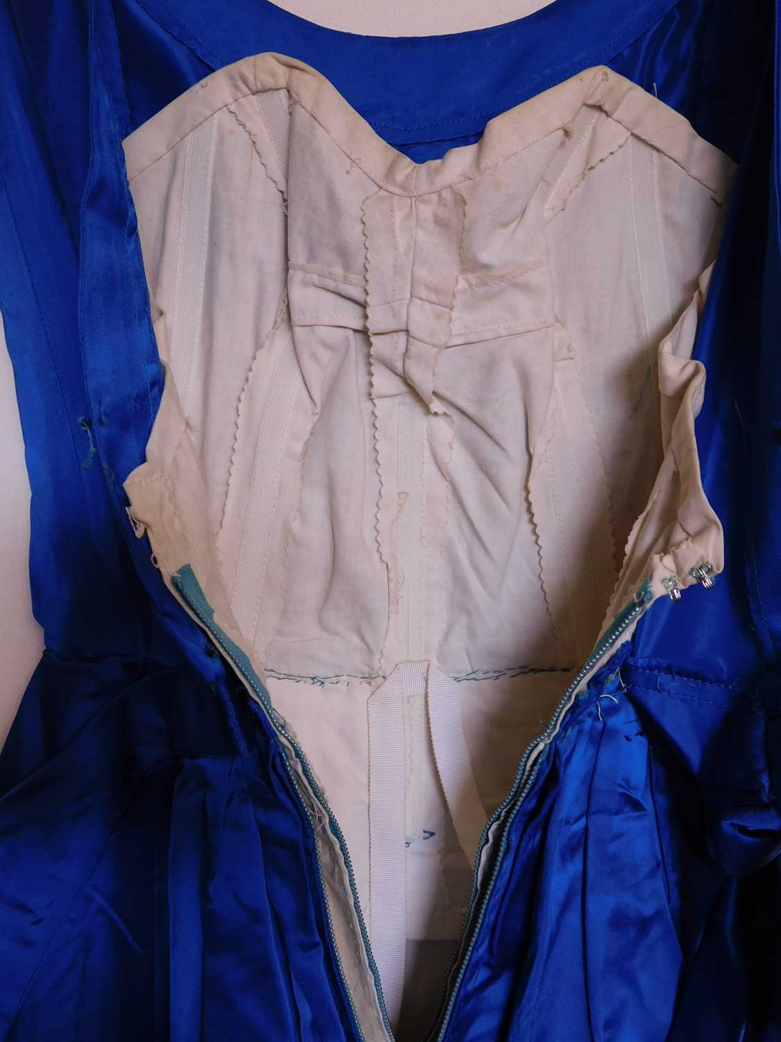 A mid 20th century evening gown, the custom made blue satin sleeveless shift with deep V-back and - Image 3 of 6