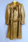A post WWII German dark green leather belted trench coat