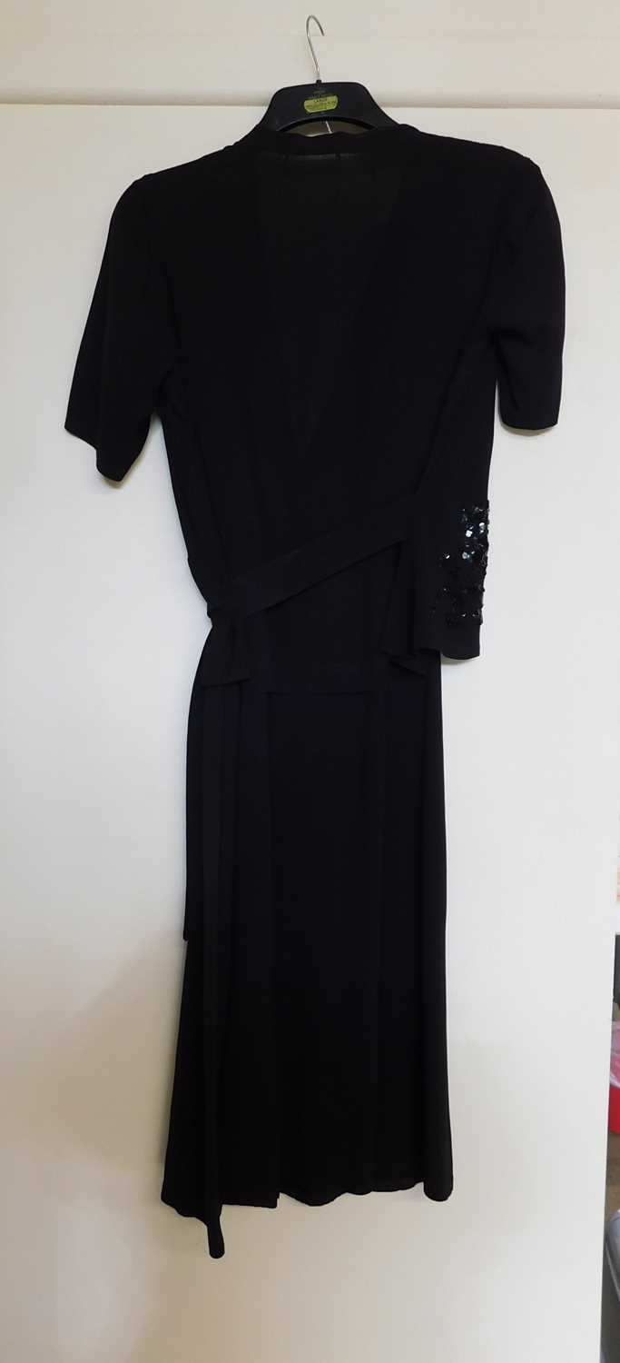 A black velvet evening gown, the sleeveless bias cut V-neck gown with matching shrug and long velvet - Image 10 of 10