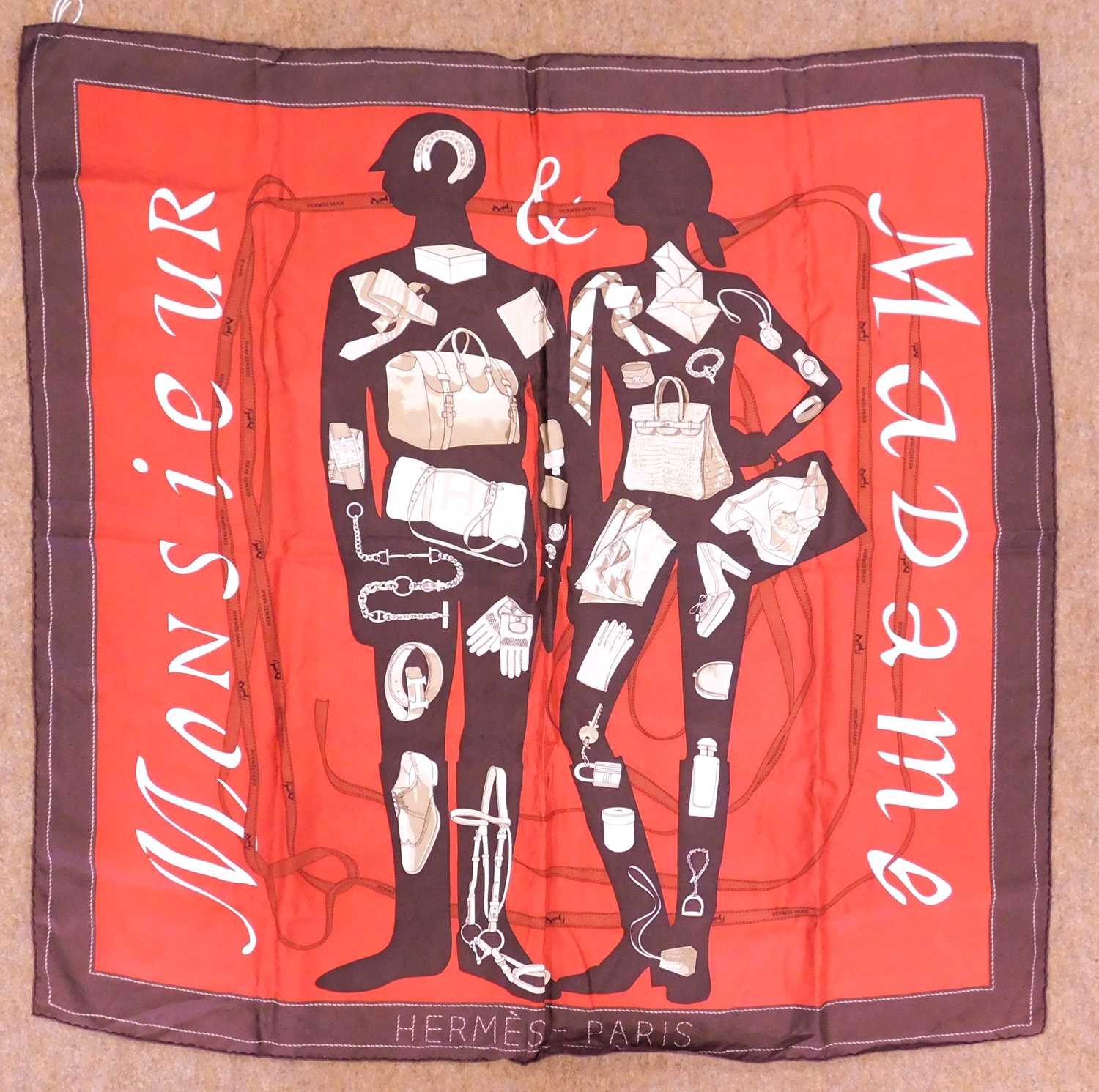 An Hermes 'Madame Monsieur' silk scarf, approx. 88 x 88cm, boxed box - some marks scarf - a few