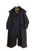 A Barbour 'Stockman' coat, full length wax coat, size Large