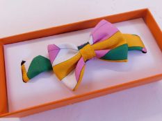 An Hermes 'Nu Papillon' silk mini bow tie bracelet, boxed