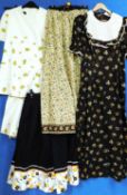 A quantity of circa 1970's lady's wear: to include a brown floral short sleeve full length dress