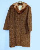 A brown Astrakhan single breasted coat with mink collar