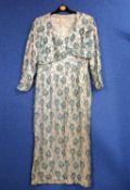 A mid 20th century blue beaded shift dress and matching bolero jacket by Mandell Couture