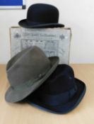 Three hats, to include a bowler by Dunn & Co., a khaki green trilby by Lincoln Bennett and a black