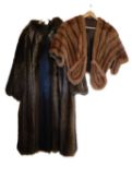 A short fur cape with front pockets/hand warmers and a full length fur coat, (2)