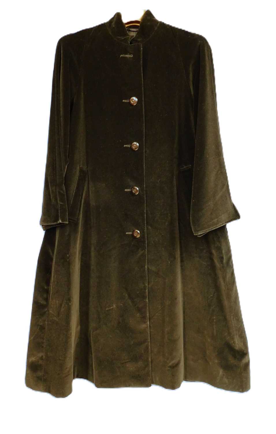 A lady's black velvet Aquascutum coat, single breasted with side slip pockets