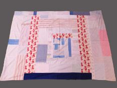 A mid 20th century patchwork bed cover, approx. 165 x 218cm