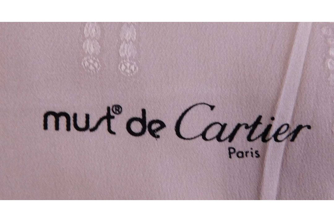 An Escada and a Must de Cartier scarf, each approx. 88cm x 88cm, (2) - Image 2 of 3