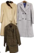 Three lady's coats, to include a tweed, cream and fur trimmed coat by Mornessa, a mid 20th Century