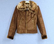 A brown faux suede and faux fur jacket by Kosha size S/10 with zip front, zip pockets and buckle