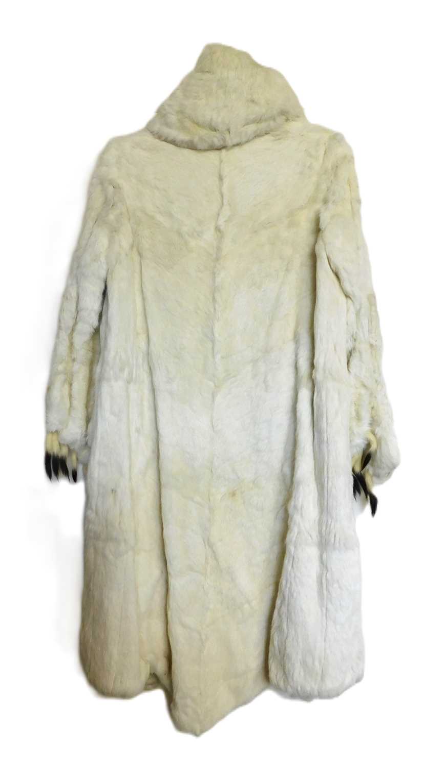 A lady's full length cream fur coat, with high turn up collar and balloon cuffed sleeves with - Image 2 of 6