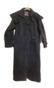 A Driza-Bone 'Riding Coat', full length wax coat, size 5 M