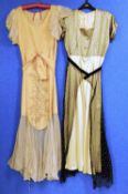 Two c.1930's lady's dresses, to include an apricot satin and net dress with V neck, net sleeves
