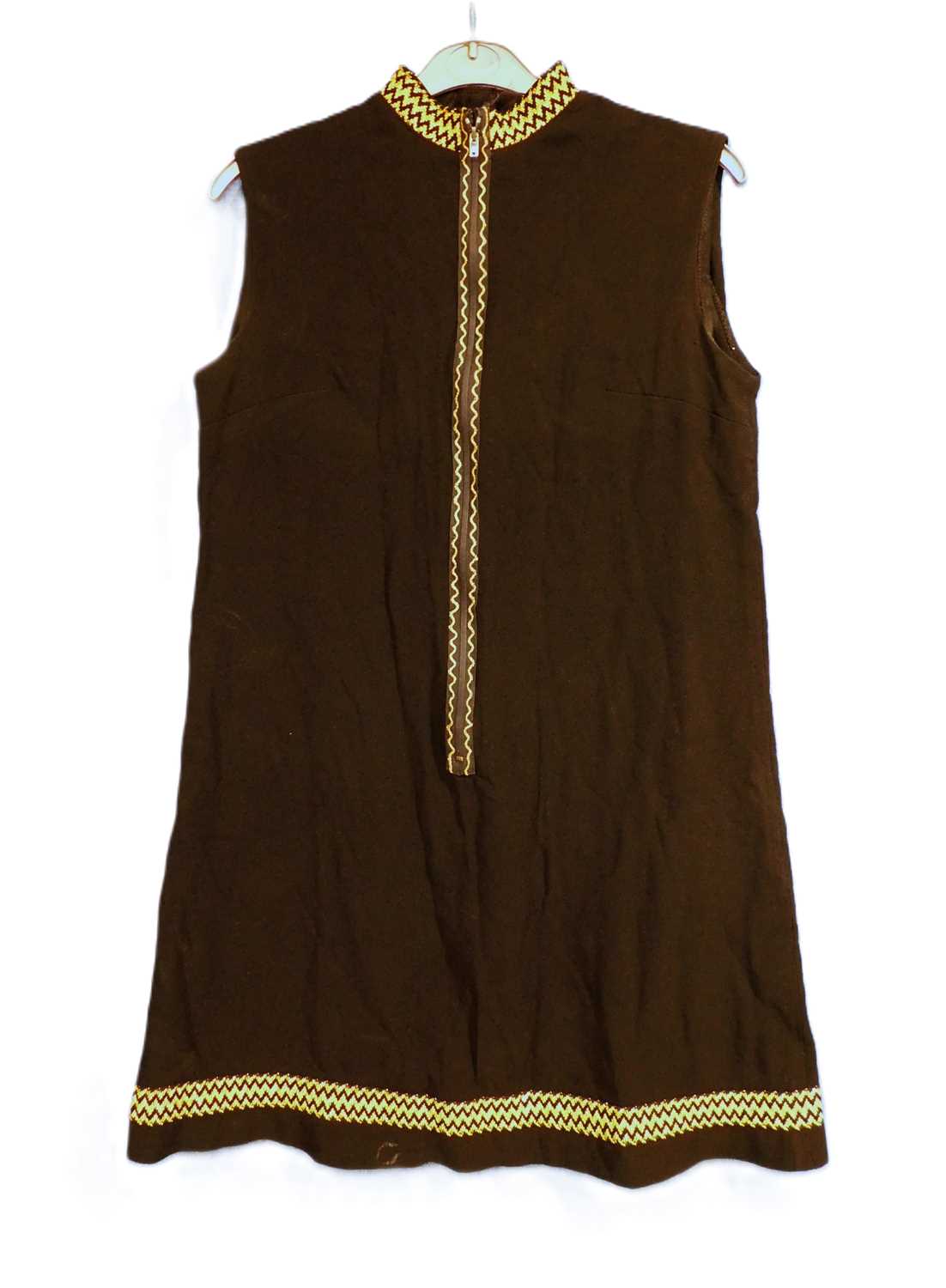 A ladies mid 20th Century sleeveless shift mini dress with black and gold detailing to neck and hem, - Image 2 of 2