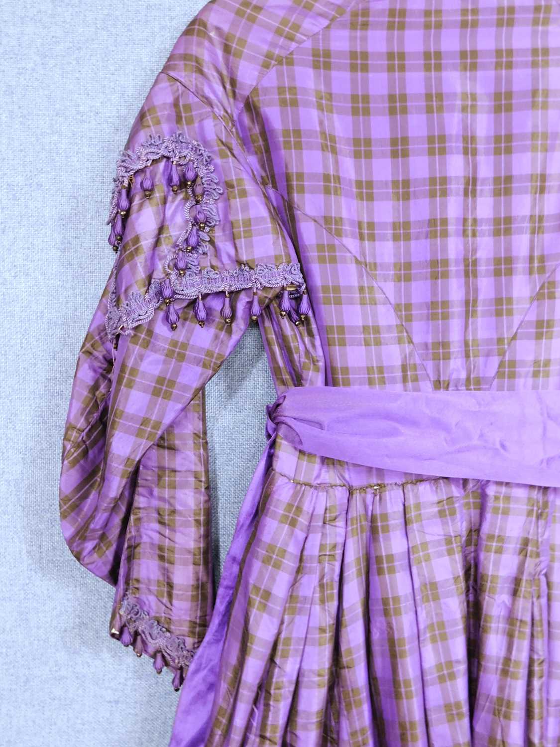 A lady's late Victorian purple check day dress, with button front, full skirt, sash waist, braided - Image 7 of 12