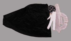 An adapted Victorian black satin skirt, a quantity of machine made lace, a pair of gloves and a