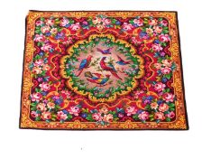 An early 20th century velvet table cover/piano throw, with original paper label to reverse,