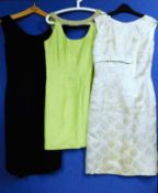 Three mid 20th Century lady's cocktail dresses: to include a black floral broderie anglaise style
