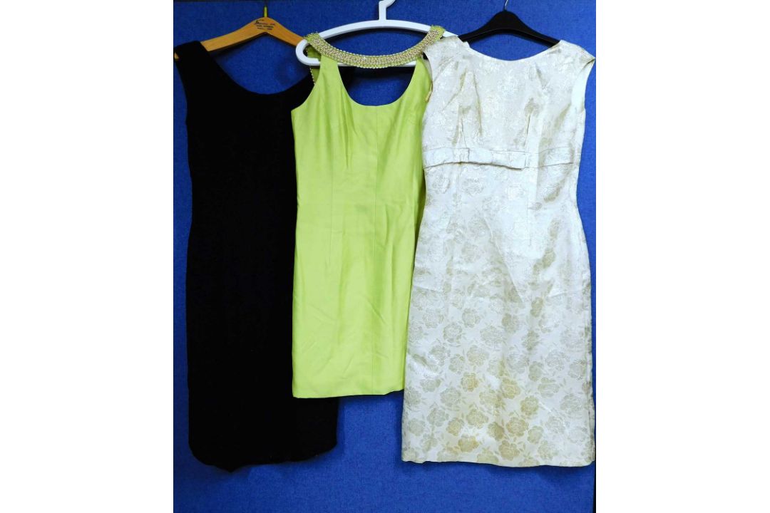 Three mid 20th Century lady's cocktail dresses: to include a black floral broderie anglaise style - Image 1 of 5