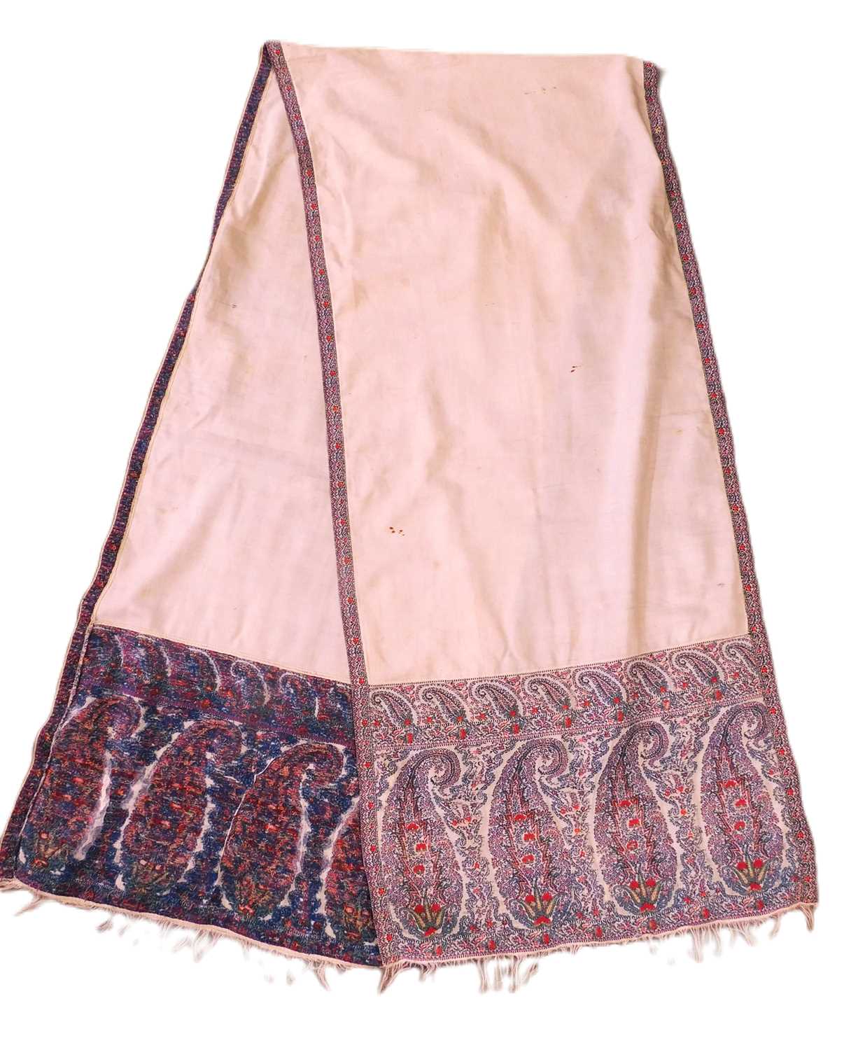 A 19th century shawl, with cream ground and red and blue paisley to ends and edges, approx. 226 x