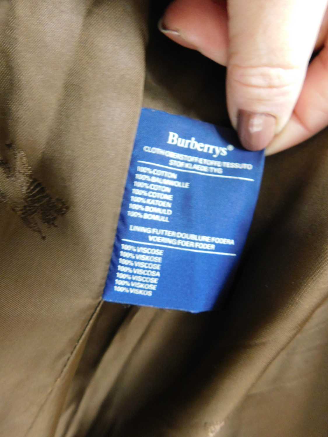 A lady's double breasted Burberry trench coat, in green check with brown buttons, belted waist and - Image 8 of 10