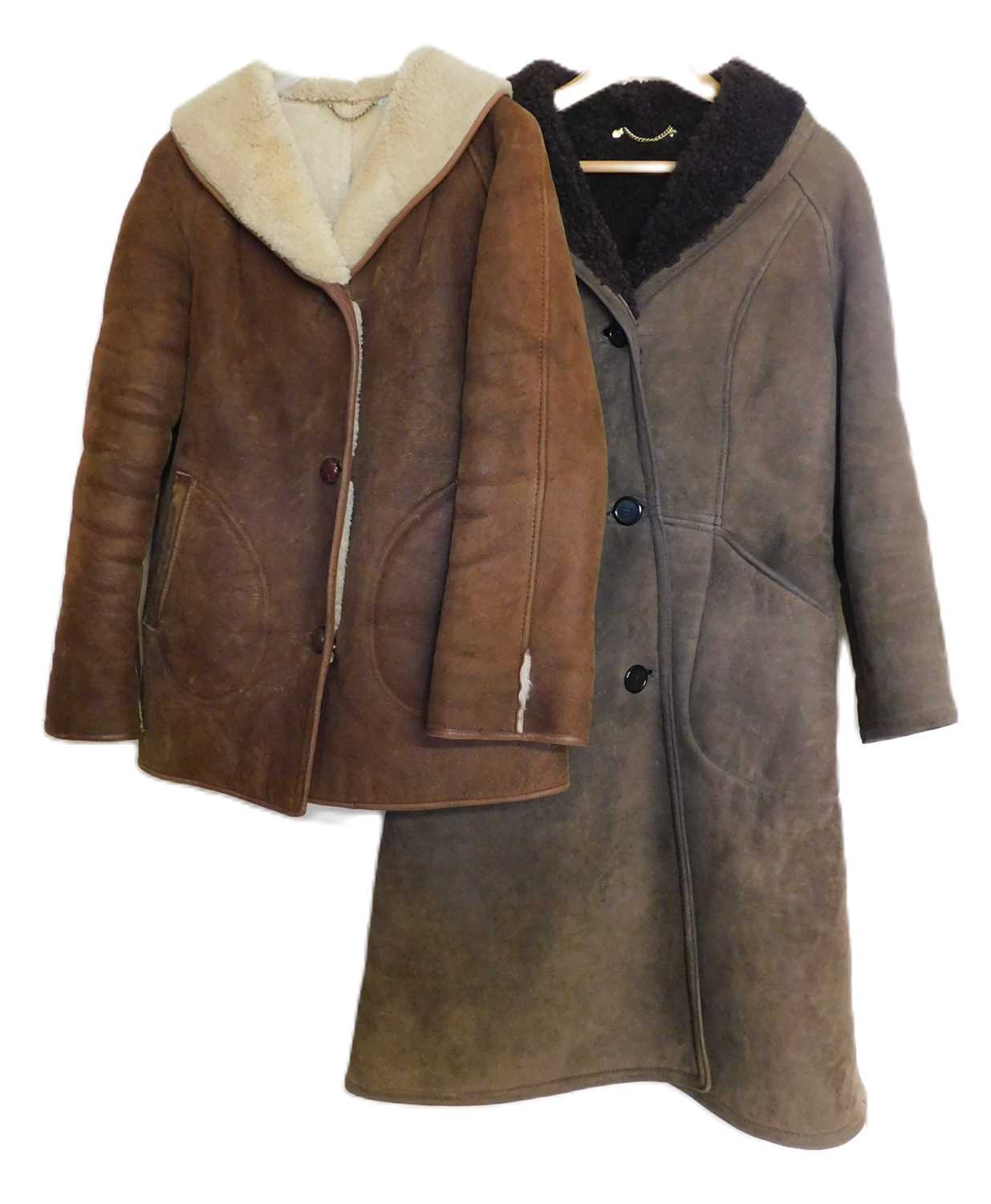Two sheepskin coats, both single breated with front patch pockets, approx. 36 - 40" chest